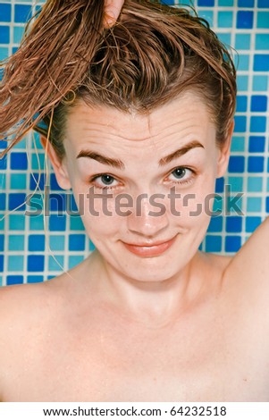Wet hair blond woman after shower