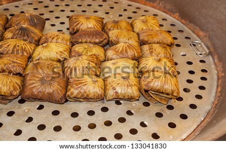 Ancient Thai food rice wrapped in lotus leaves
