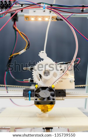 Electronic three dimensional plastic printer during work in school laboratory 3D printer 3D printing Electronic three dimensional plastic printer during work in school laboratory 3D printer 3D printing