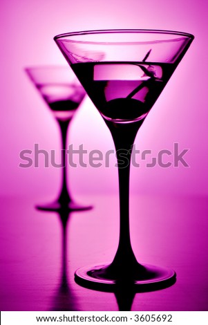 Martini glass on purple background (shallow depth of field)