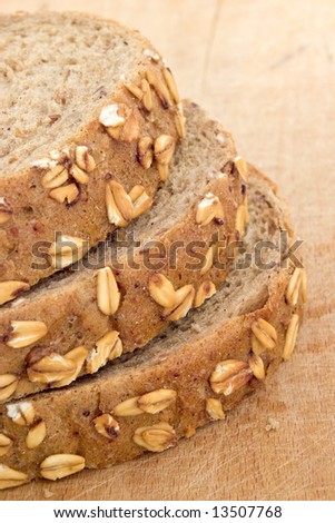 three slice of wholegrain bread with seed