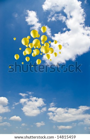yellow balloons on sky