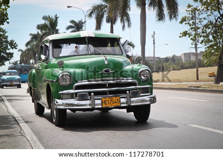 HAVANA-FEBRUARY 4:Classic green Plymouth on February 4, 2010,Havana.Under current law that the government plans to change before 2012,Cubans can only buy and sell cars that were in use before 1959.
