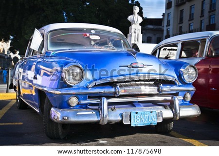 HAVANA-JANUARY 8:Classic blue Plymouth on Jan 8, 2010,Havana.Under current law that the government plans to change before 2012,Cubans can only buy and sell cars that were in use before 1959.