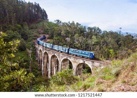 Train on the Nine Arches Demodara Bridge or the Bridge in the sky , Sri Lanka. Nine Arches Bridge is located in Demodara near Ella city Sri Lanka.