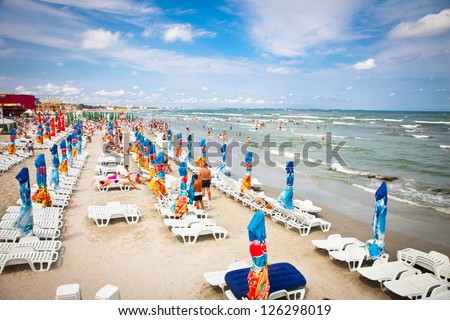 MAMAIA,ROMANIA-AUGUST 11:Beautiful beach in summer on August 11, 2012 Mamaia, Romania. Mamaia is one of most popular summer destination in Romania for hundred of thousands of tourists a year.