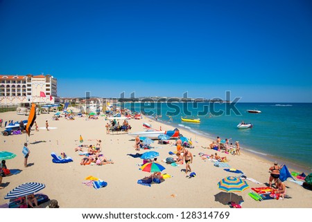 BYALA, BULGARIA-AUGUST 15:Crowded beach with tourists in summer on August 15, 2012 in Byala, Bulgaria. The number of foreigners, visiting Bulgaria in August 2012, amounted to 1 637.8 thousand people.