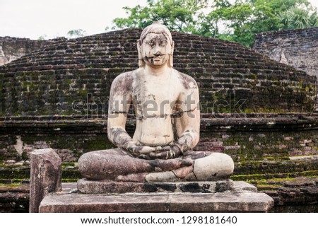 Buddha statues at  Vatadage ancient structure dating back to the Polonnaruwa Kingdom of Sri Lanka.
