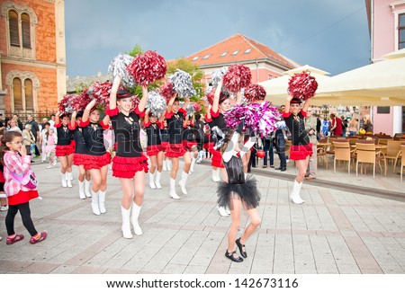 NOVI SAD, SERBIA - JUNE 7:  Majorettes carnival procession  Zmaj children\'s games on June 7, 2013 in Novi Sad, Serbia