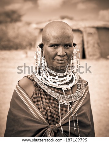 TANZANIA, AFRICA-FREBOARY 9, 2014: Masai woman with traditional  ornaments, review of daily life of local people on February 9, 2014. Tanzania.