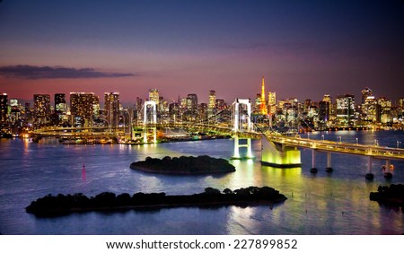 Rainbow Bridge and Sumida River in Tokyo, Japan. Night photo.