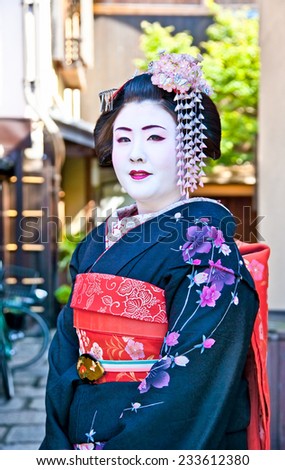 KYOTO,JAPAN-OCT 24,2014:Unidentified geisha on Oct 24,2014 , Kyoto,Japan. Apprentice geisha in western Japan, especially Kyoto.Their jobs consist of performing songs, dances, and playing the shamisen.