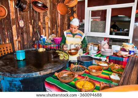 TEOTIHUACAN, MEXICO - DEC 4, 2015: Mexican restaurant chef in Teotihuacan, Mexico on Dec 4, 2015. Mexican food is well-known for its exotic flavors and the use of strong spices.