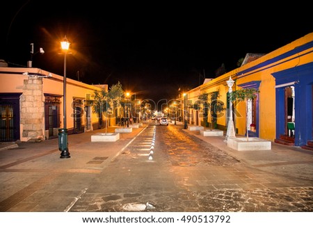 Street of Oaxaca by night, Mexico. The city architecture of Oaxaca is protected by UNESCO