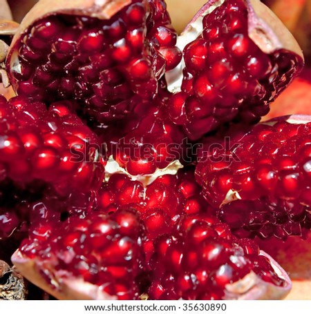 Pomegranate background for sale at a market for farm products, India