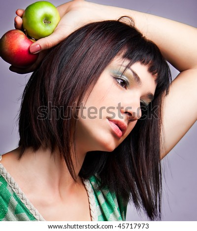 Close up beautiful young woman with fresh apple, natural beauty artistic portrait.