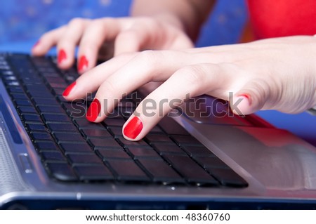 Woman hands typing on a laptop , business concept