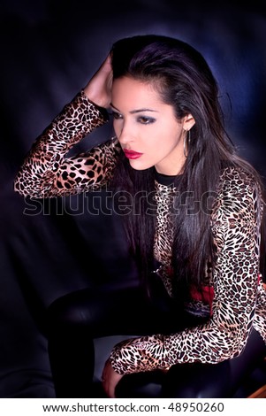 Photo-session of the young beautiful  brunette.Studio shot.