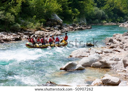 NERETVA, BOSNIA - 25 JULY: Unidentified teams practice at the first day of training for World Rafting Championship in the canyon of River Neretva on July 25, 2009, Bosnia and Herzegovina.