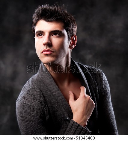 Fashion Shot of a Young Man A trendy European man dressed in contemporary cloth. He is now a professional model.