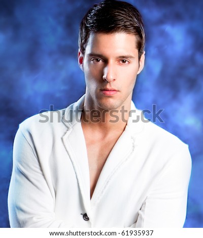 Fashion Shot of a macho Man. A trendy European man dressed in contemporary cloth. He is now a professional model.
