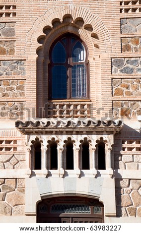 Window, detail on building of train station in Toledo, Spain