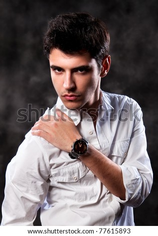 Fashion Shot of a Young Man A trendy European man dressed in contemporary cloth. He is now a professional model.
