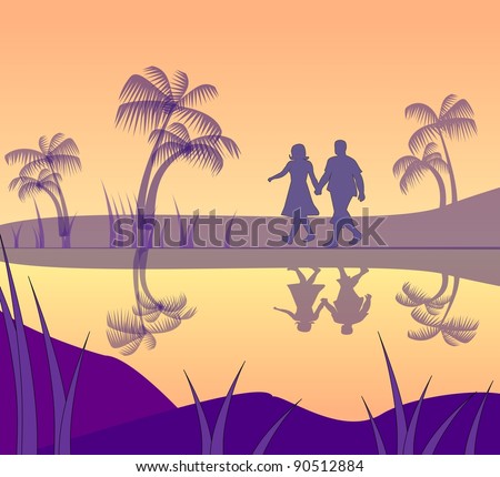 A couple walking hand in hand by the sea at sunset.