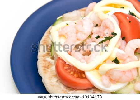 Tasty shrimp sandwich on blue plate isolated on white