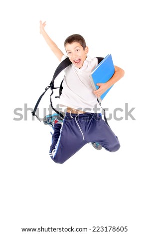 little boy at school jumping isolated in white