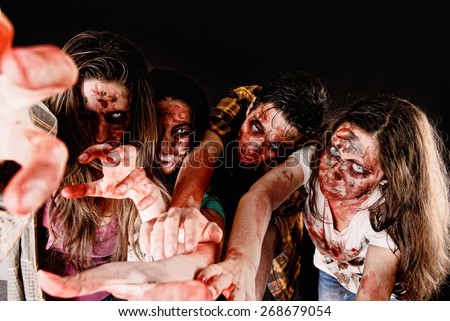 zombies isolated in dark background