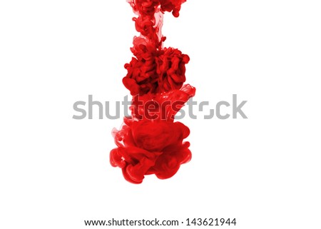 Red watercolor dropped into water isolated on white