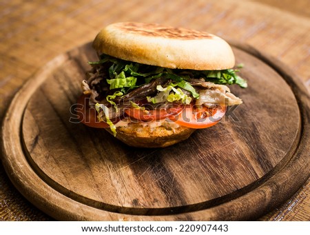 Special organic american cheese burger with fresh salad in restaurant