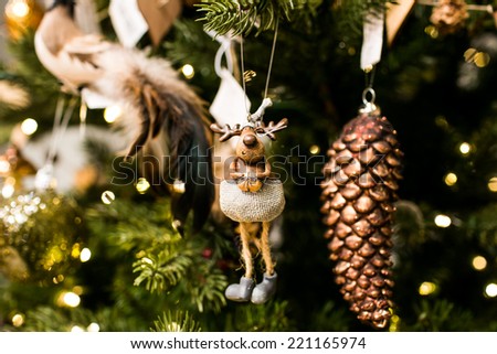 Closeup of a toy dog - a beautiful hand-made christmas tree decorations made for New Year celebration
