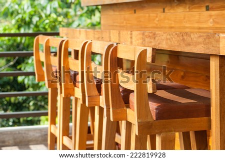 Wood Chairs and bar.
