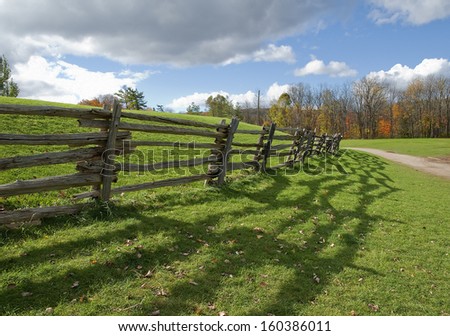 old fence in the country on a autumn day