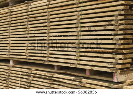 stock-photo-stacked-wood-planks-56382856.jpg