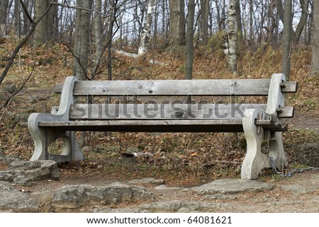 old bench inviting to rest in the forest