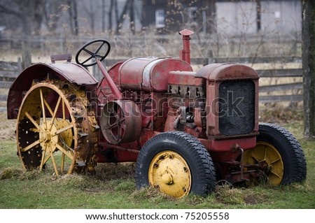 old red abandoned  farm truck