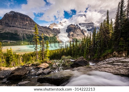 Robson Peak, Berg Lake, and Berg Glacier from Toboggan Falls in Robson Provincial Park, Canada.