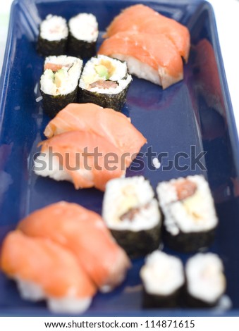 Several types of home made sushi rolls. Shallow depth of field.