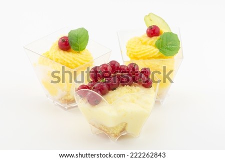 mini dessert with cream and currant
