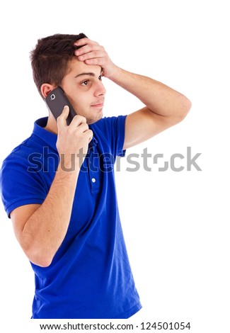 Portrait of a young man talking on the phone with hand on forehead isolated on white background