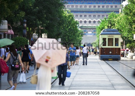 BEIJING, CHINA Ã¢Â?Â? July 15: Dashilan Commercial Street, Tourists and shoppers line Qianmen Street on July 15, 2014 in Beijing, China.