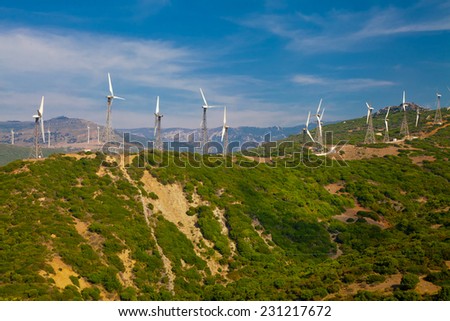 Electrical windmills system along the hill back (power production)