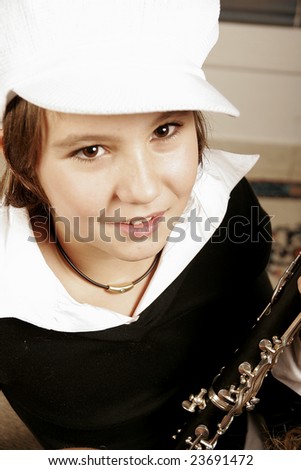 young girl playing clarinet