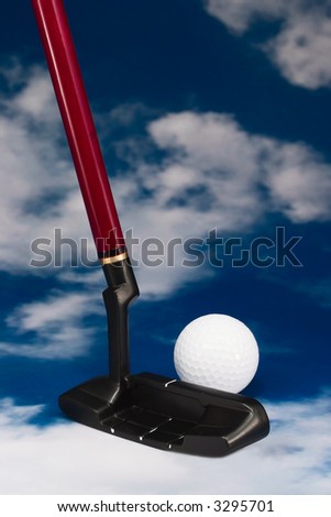 iron and golf ball on blue sky background. back side