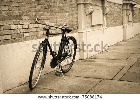 Old  Bicycle leaning on a Wall  in Italy
