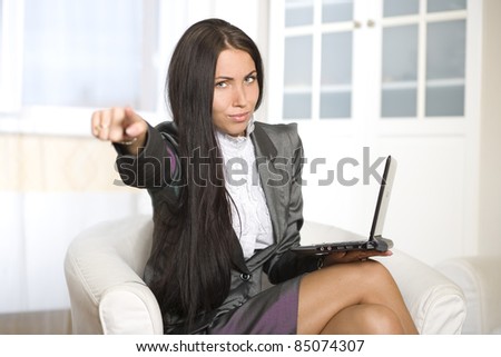 Portrait of lovely young female  with Computer
