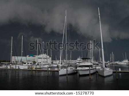 Nasty storm rolling in at a marina giving a dramatic, ominous  feel